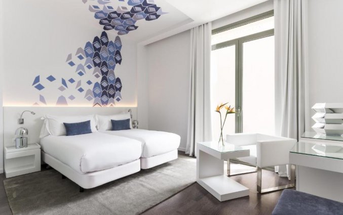 Slaapkamer van hotel Room Mate Carla in Barcelona